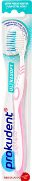 Prokudent ULTRASOFT, różowo-biała szczoteczka do zębów z miękkimi włóknami, widok z przodu w opakowaniu.