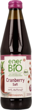 EnerBiO sok żurawinowy Rossmann w szklanej butelce z purpurową nakrętką, widok z przodu na białą etykietę.