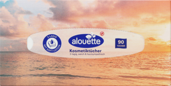 Długie białe opakowanie chusteczek Alouette Kosmetiktücher 90 sztuk z niebieskim logo, na tle zachodzącego słońca.