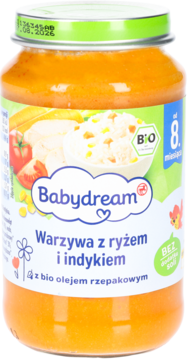 Babydream słoiczek z puree warzywno-ryżowym z indykiem, widok z przodu. Etykieta z daniem i napisem "od 8. miesiąca".