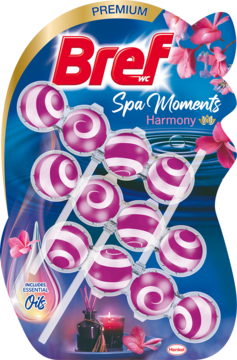 Bref Spa Moments Harmony WC kuleczki, różowo-białe paski, na tle z kwiatami i wodą.