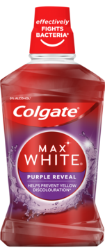 Colgate Max White Purple Reveal płyn do płukania ust w przezroczystej butelce. 0% alkoholu, zwalcza bakterie.