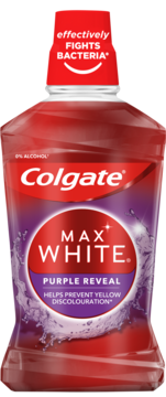 Colgate Max White Purple Reveal płyn do płukania ust w przezroczystej butelce. 0% alkoholu, zwalcza bakterie.