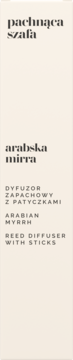 Dyfuzor zapachowy z patyczkami "Arabska mirra", pionowa etykieta z czarnym tekstem "pachnąca szafa" na beżowym tle.