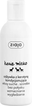 Biała butelka Ziaja Kozie Mleko odżywka do włosów suchych i szorstkich, widok z przodu, z czarnym napisem.