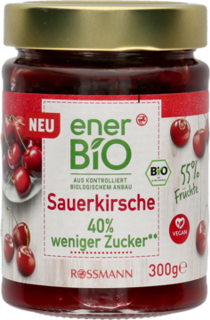 Szklany słoik konfitury Ener Bio Sauerkirsche z Rossmanna, z 40% mniej cukru i 55% owoców, widok z przodu.