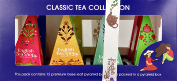 Kolekcja English Tea Shop: 12 organicznych herbat w kolorowych piramidkach, widoczna w granatowym pudełku.