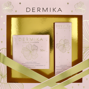 Zestaw Dermika Luxury Placenta 50+ w różowo-złotym pudełku z kwiatowym wzorem, kremem i serum.