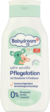 Biała butelka Babydream extra sensitiv Pflegelotion z masłem shea i pantenolem, 0% mikroplastiku, widok z przodu.