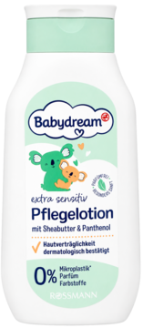 Babydream extra sensitiv Pflegelotion z masłem shea i pantenolem, biała butelka z koalami, 0% mikroplastiku, widok z przodu.