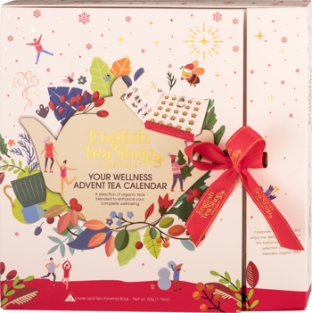 English Tea Shop Organic Wellness Advent Tea Calendar, białe pudełko z świątecznymi ilustracjami i czerwoną wstążką, widok z przodu.