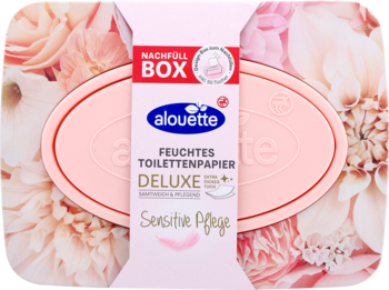 Różowe opakowanie uzupełniające Alouette DeLuxe nawilżanego papieru toaletowego „Sensitive Pflege” z kwiatami.