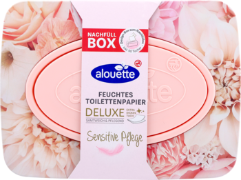 Różowe opakowanie uzupełniające Alouette DeLuxe nawilżanego papieru toaletowego „Sensitive Pflege” z kwiatami.