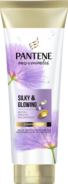 Odżywka Pantene Pro-V Miracles Silky & Glowing z Biotiną i Keratyną w białej tubce, widok z przodu.