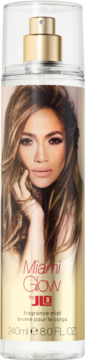 Mgiełka do ciała J.Lo Miami Glow w przezroczystej butelce z wizerunkiem J.Lo i złotym atomizerem.