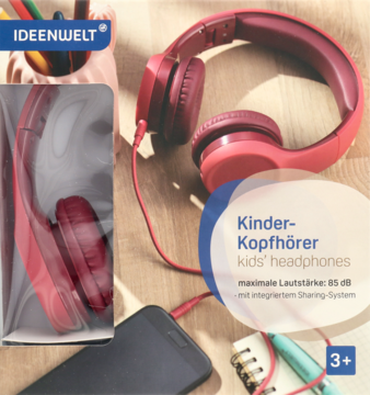 Słuchawki dziecięce Ideenwelt, czerwone, składane, z kablem, max. 85 dB, na drewnianym stole ze smartfonem.