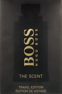 Czarne pudełko Hugo Boss The Scent Travel Edition ze złotym napisem i błyszczącym obrysem butelki, widok z przodu.