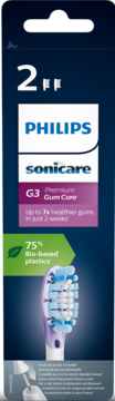 Ciemnoniebieskie opakowanie 2 końcówek Philips Sonicare G3 Premium Gum Care z widoczną fioletową główką.