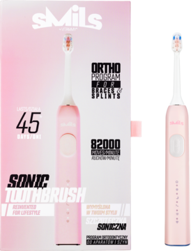 Różowa szczoteczka soniczna VITAMMY Smils w eleganckim pudełku i osobno, widok z przodu.