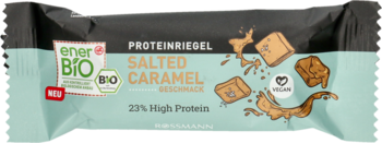 Baton proteinowy enerBiO Salted Caramel, miętowe opakowanie, 23% białka, z logo BIO i VEGAN.