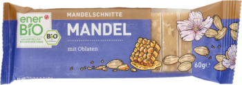 Niebieskie opakowanie batonika enerBio Mandelschnitte z napisem MANDEL, migdałami i nasionami chia, 60g.