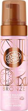 Różowa butelka pianki brązującej BodyBoom Bronze z brązową pompką, z arbuzowymi grafikami, widok z przodu.