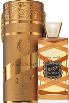 Złota butelka i bogato zdobione pudełko Lattafa Oud Mood Elixir, woda perfumowana unisex, stojące obok siebie.