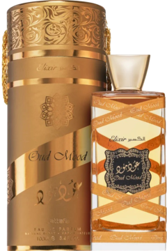 Złota butelka i bogato zdobione pudełko Lattafa Oud Mood Elixir, woda perfumowana unisex, stojące obok siebie.