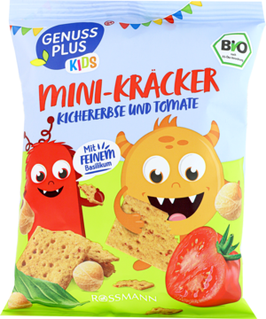 Przednie opakowanie Minikrakersów Genuss Plus Kids ciecierzyca i pomidor, z kreskówkowymi potworkami i warzywami.