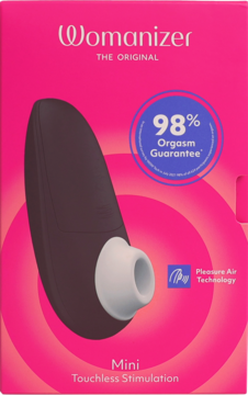 Womanizer Mini 2 w różowym pudełku, z czarnym stymulatorem i hasłem 98% Orgasm Guarantee, widok z przodu.
