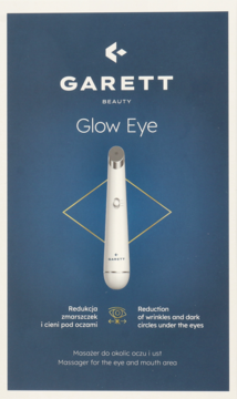 Biały masażer Garett Beauty Glow Eye na niebieskiej karcie produktu. Redukcja zmarszczek i cieni.