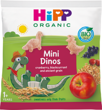HiPP ORGANIC Mini Dinos, biała saszetka z uśmiechniętym dinozaurem, owocami i zbożowymi chrupkami.