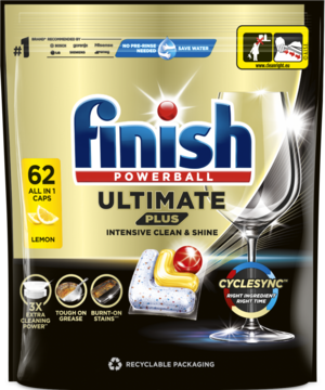 Kapsułki Finish Ultimate Plus Lemon 62 szt. w czarno-złotym opakowaniu, z widocznym kieliszkiem i kapsułką.