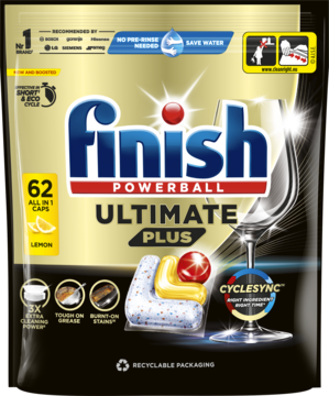 Czarne opakowanie Finish Powerball Ultimate Plus Lemon, 62 kapsułki do zmywarki, z lśniącym szkłem, widok z przodu.