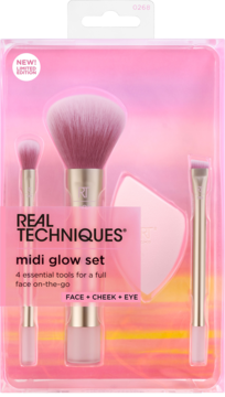 Real Techniques Midi Glow Set: 3 różowe pędzle i gąbka w przezroczystym opakowaniu, widok z przodu.