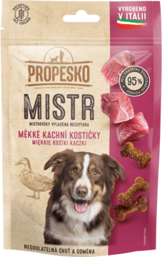 Propesko Mistr: miękkie kacze kostki dla psa, 95% białka. Beżowo-różowe opakowanie z psem.