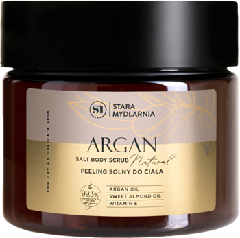 Brązowy słoik peelingu solnego Argan Stara Mydlarnia, z czarną nakrętką i beżową etykietą z złotymi detalami, widok z przodu.