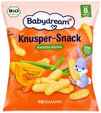 Pomarańczowa paczka BIO chrupek Babydream Karotte-Kürbis dla dzieci 8m+, bez cukru, z rysunkiem królika i warzyw.