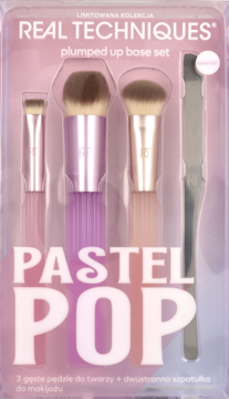 Real Techniques Plumped Up Base Set Pastel Pop: 3 pędzle do makijażu i srebrna szpatułka w różowym opakowaniu.