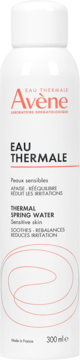 Avène Eau Thermale, biała butelka aerozolowa z czerwonym logo i napisem, widok z przodu, 300ml, do skóry wrażliwej.