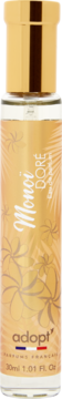 Perfumy adopt' Monoi Doree 30ml, bursztynowa butelka z tropikalnym wzorem liści, złota nakrętka.