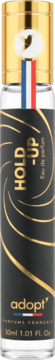 Adopt Hold Up Eau de Parfum w czarnej butelce ze złotymi spiralami, francuską wstążką pod złotą nakrętką.