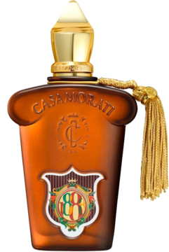 Bursztynowa butelka perfum unisex 1888 Xerjoff z matowego szkła, ze złotym korkiem, chwostem i herbem.
