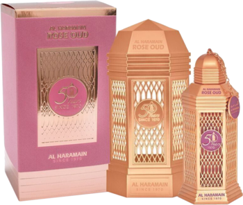 Al Haramain 50 Years Rose Oud perfumy w różowo-złotych butelkach o kształcie lampionu i dopasowanym pudełku.