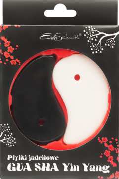 Czarne pudełko z zestawem płytek jadeitowych Gua Sha Yin Yang, czarno-białe kamienie w kształcie symbolu Yin Yang.