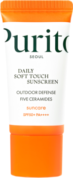 Purito Daily Soft Touch Sunscreen SPF50+ PA++++ w biało-pomarańczowej tubce, widok z przodu.