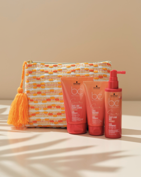 Zestaw BC Sun Protect: 3 pomarańczowe butelki na włosy i beżowa kosmetyczka z pomarańczowym wzorem.