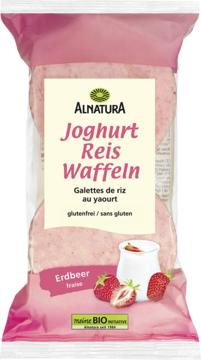 Różowe wafle ryżowe Alnatura z truskawkowym jogurtem, bezglutenowe, w opakowaniu, widok z przodu.