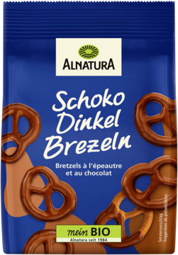 Granatowa paczka Alnatura Schoko Dinkel Brezeln, orkiszowych precli oblanych czekoladą, widok z przodu.