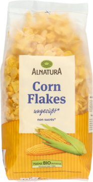 Alnatura Płatki kukurydziane bez cukru w przezroczystej torbie, front, z obrazkiem kolb kukurydzy.